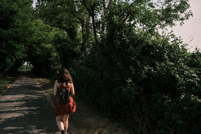 A young girl is having a walk near ferrara