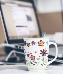Close-up of laptop on table