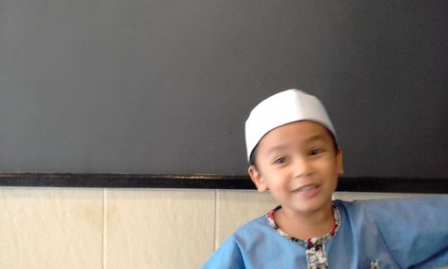 Close-up portrait of smiling boy