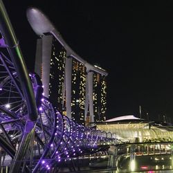 Low angle view of illuminated building at night