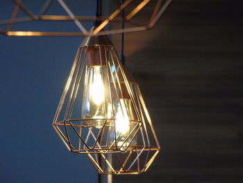 Low angle view of illuminated light bulb