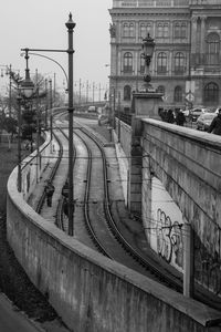 Railroad track passing through city