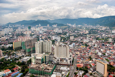 High angle view of buildings against sky in city