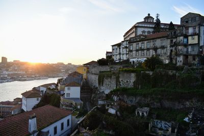 High angle view of buildings in town against sky