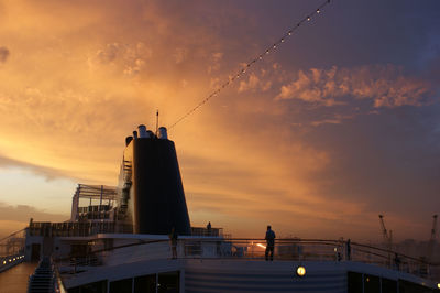Low angle view of cloudy sky at sunset