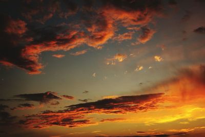 Scenic view of clouds over mountain against sky