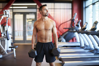 A fit man working out in the gym.