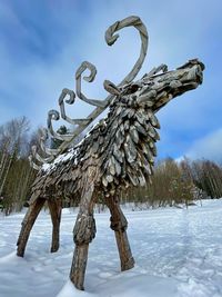 Wooden moose sculpture is located in the village of golubino, arkhangelsk oblast, russia.