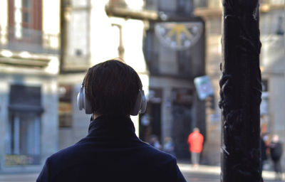 Rear view of man standing outdoors