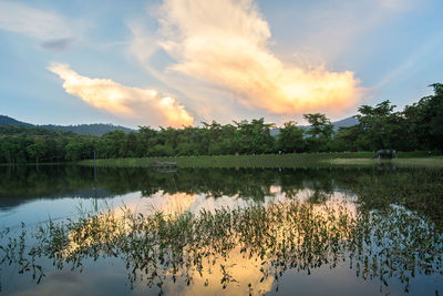 Scenic view of lake against sky during sunset