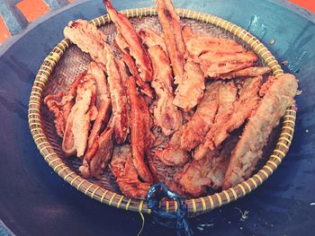 High angle view of meat in container on table