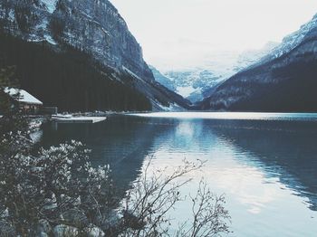 Scenic view of lake with mountains in background