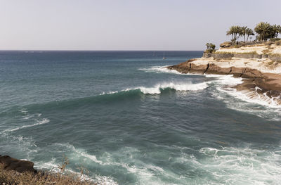 Scenic view of sea against clear sky