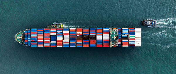 High angle view of container ship in sea