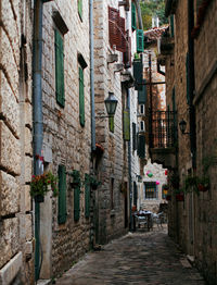 Narrow street in the old town of kotor, which is protected by unesco. excursion in the old town. 