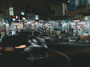 Traffic on city street at night