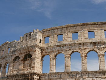 Low angle view of historical building against sky