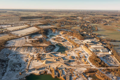 Gravel quarrying in a gravel pit during a drone flight