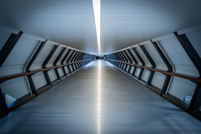 Empty footbridge in tunnel