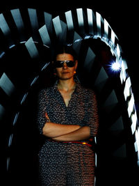 Portrait of young woman in sunglasses