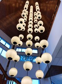 Low angle view of illuminated pendant light