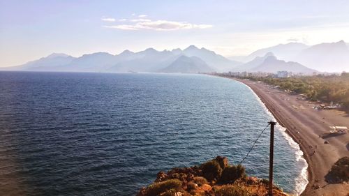 Scenic view of sea against cloudy sky