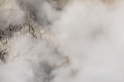 Scenic view of fog against sky