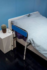 High angle view of mobility walker by bed at home