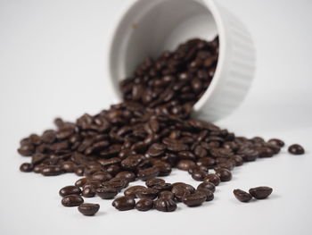 Close-up of coffee beans on table