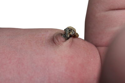 Close-up of a man with hand on the background