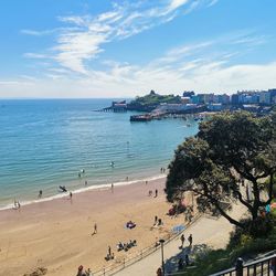 High angle view of people on beach against sky