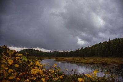 Scenic view of dramatic landscape against cloudy sky