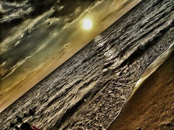 Scenic view of beach against sky during sunset