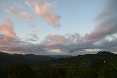 Scenic view of landscape against sky during sunset