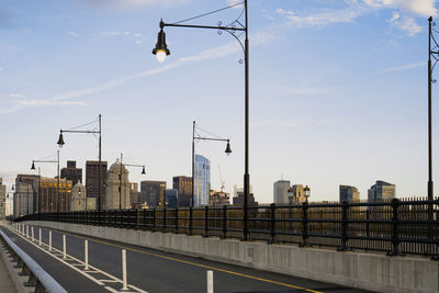 View of boston skyline and part of street from the long fellow bridge on a nice cloudless sky