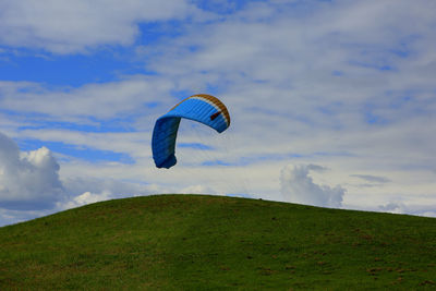 Paragliding training against sky