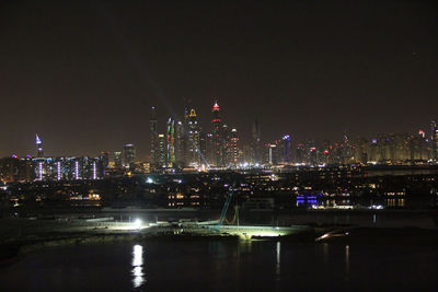 High angle view of illuminated city at night