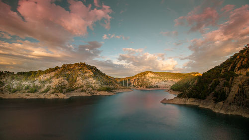 Panoramic view of lake against sky during sunset