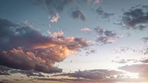 Low angle view of clouds in sky during sunset