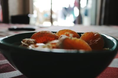 Close-up of fruits in bowl on table