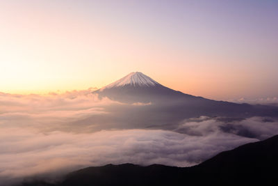 Fuji mountain with the flow of fog.