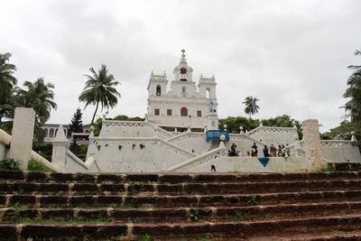 View of building against cloudy sky