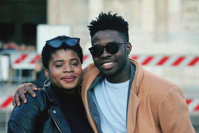 Portrait of smiling young man wearing sunglasses