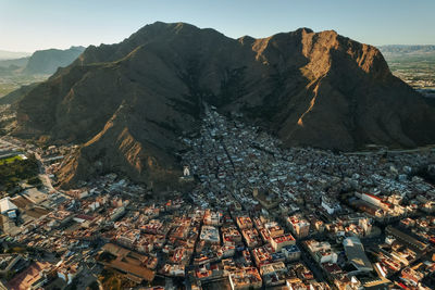 Aerial view of townscape against sky