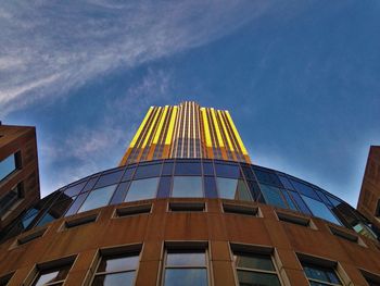 Low angle view of building against blue sky