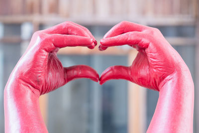 Close-up of heart shape on hand