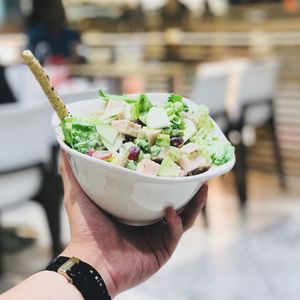 Close-up of hand holding ice cream