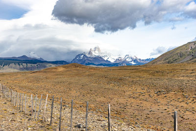 Panoramic view of snowcapped mountains against sky