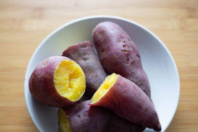 High angle view of fruits in plate on table