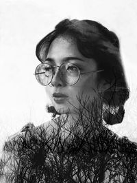 Multiple image of young woman wearing eyeglasses looking away and bare trees against white background